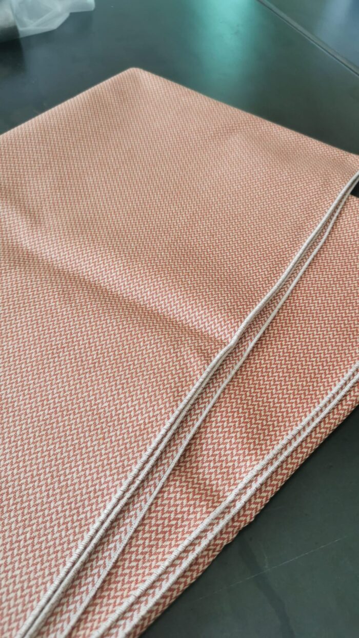 Cotone cerato corallo bordato 140x215cm